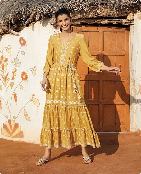 Anita Dongre -Designer - Charu Creation Blog - Jalsa Collection - Spring/Summer 2020 - Rajasthan - Rajasthani inspired - desert - printed fabric - fit and flare dress - round neckline - quirky - feminine - woman - dress - garment - brown printed fabric - beige dress - balloon sleeve